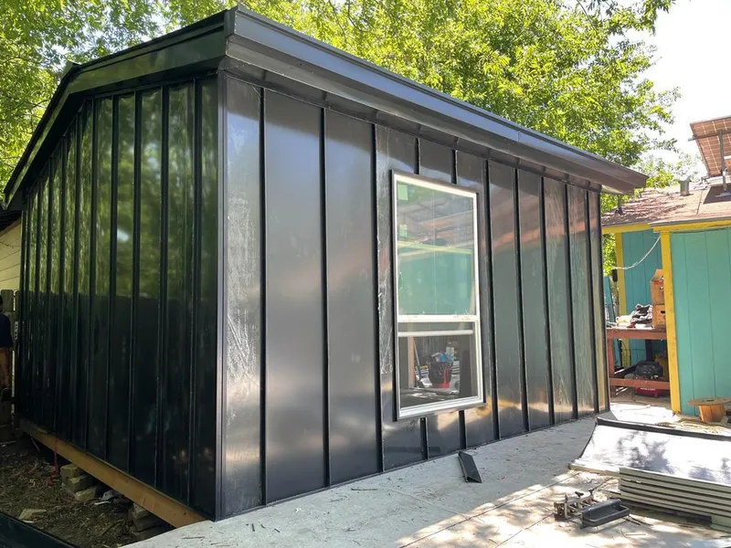 Black standing seam metal wall panels for Metal Roof Installation in Valley City